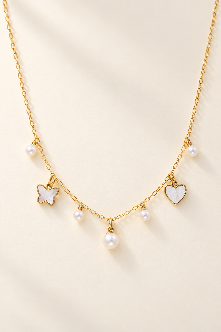 Collana Perla, Farfalla e Cuore in Oro