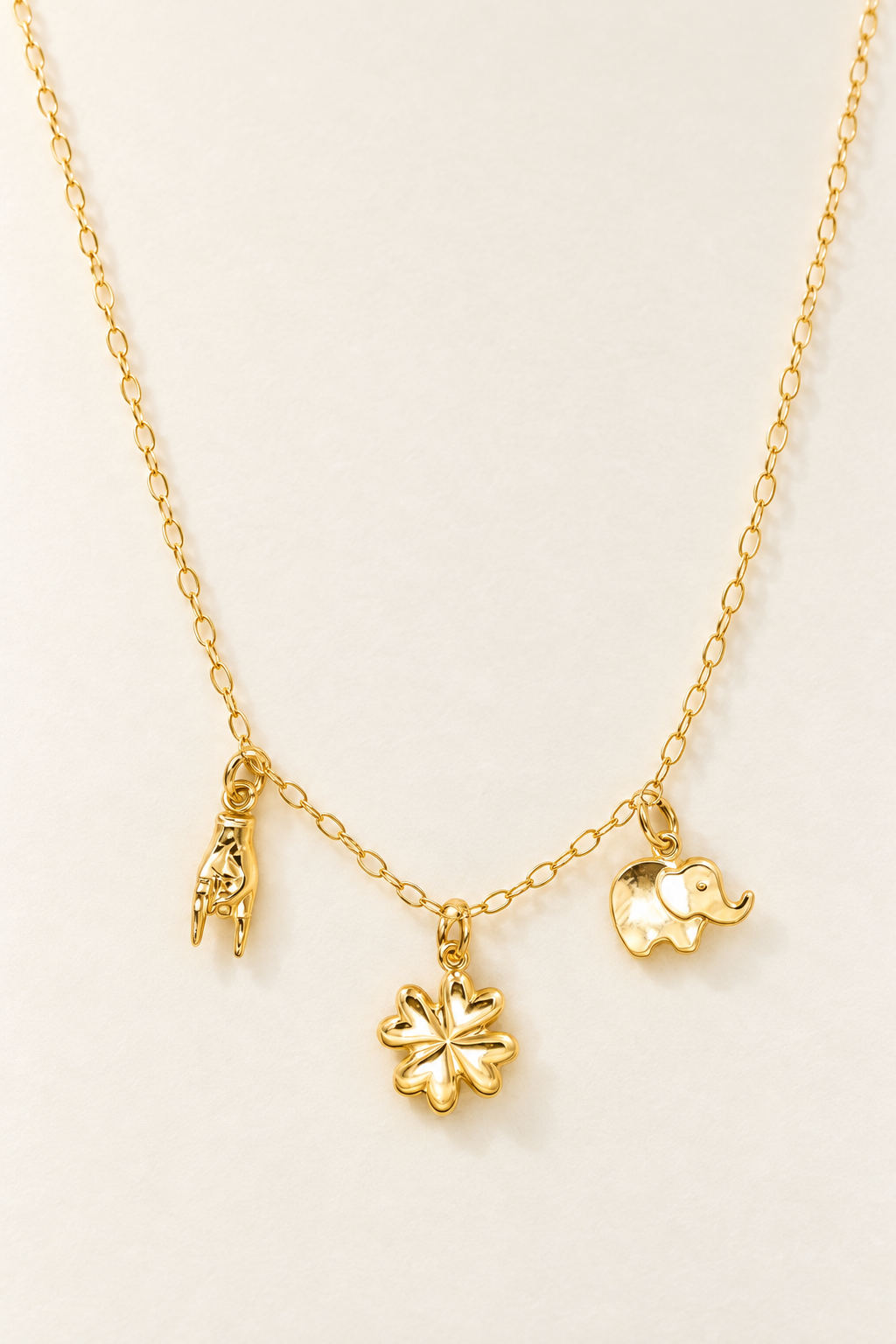 Collana Quadrifoglio, Corna ed Elefantino in Oro - Oro Giallo 18 kt | Facco Gioielli