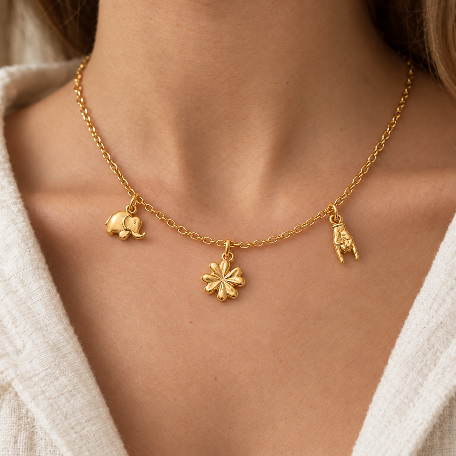 Collar Trébol de Cuatro Hojas, Elefantito y Cuerno en Oro